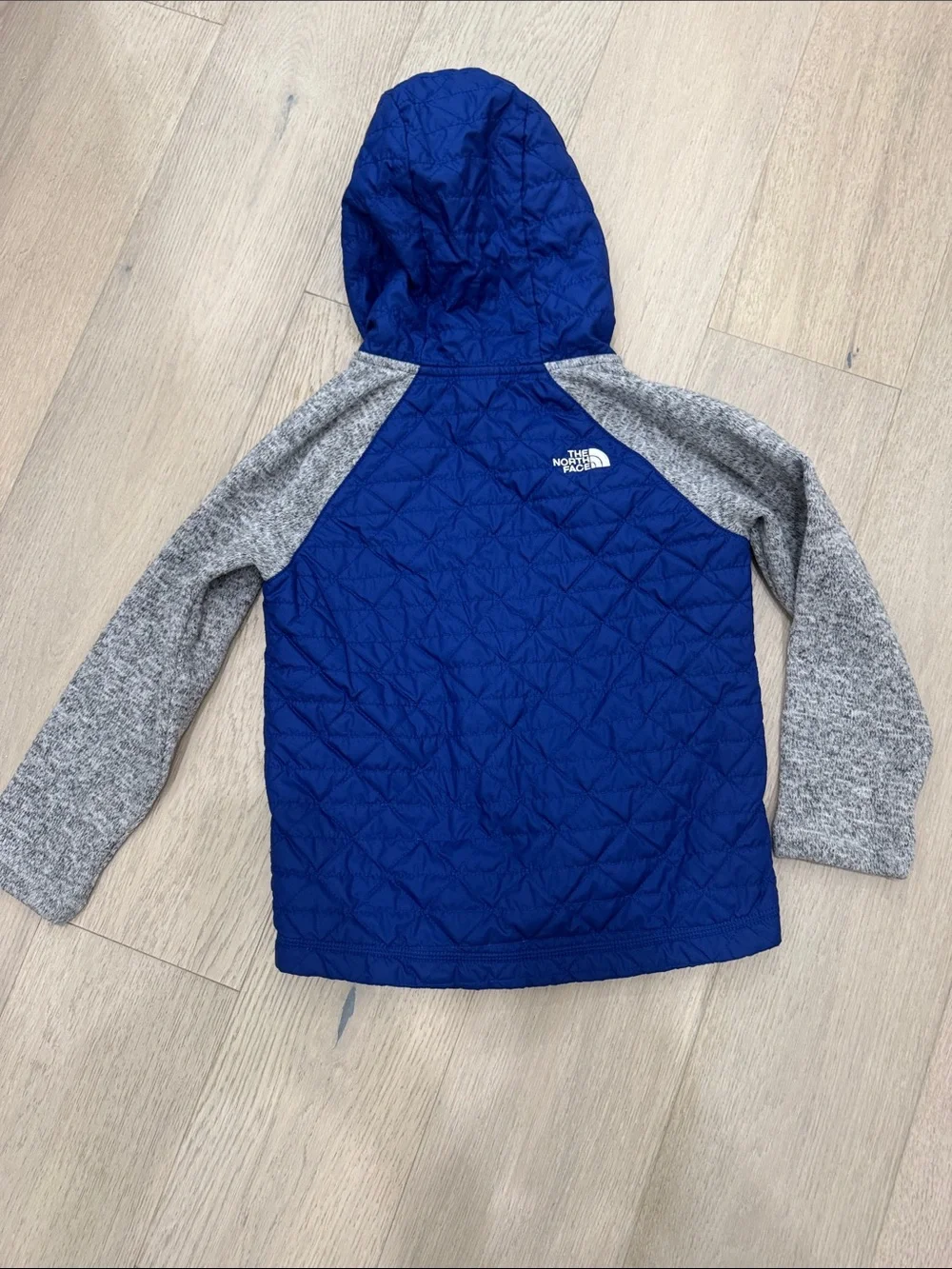 The North Face Royal Blue Quilted Hooded Jacket with Gray Sleeves